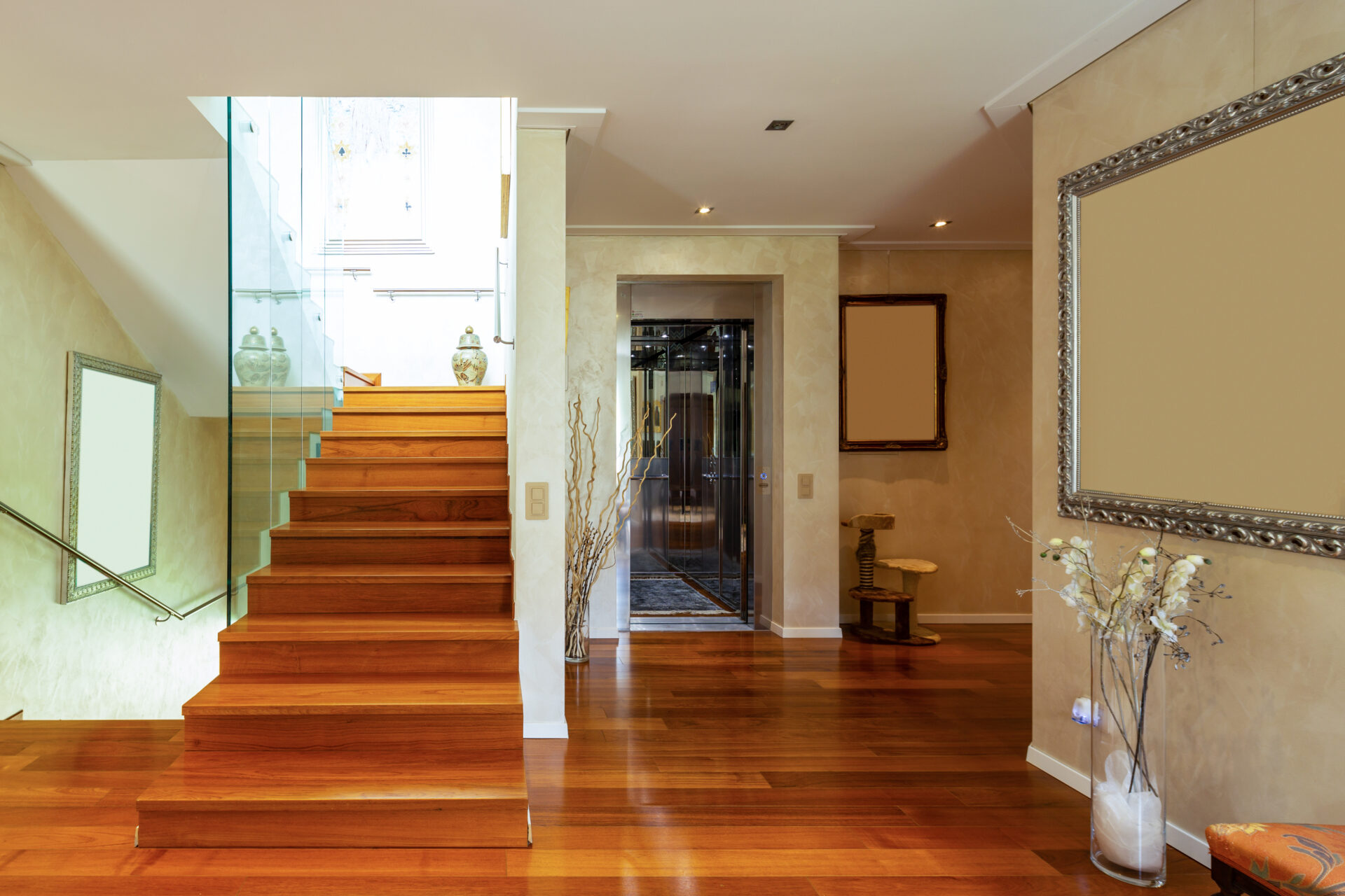 Entry with stairs and glass, parquet