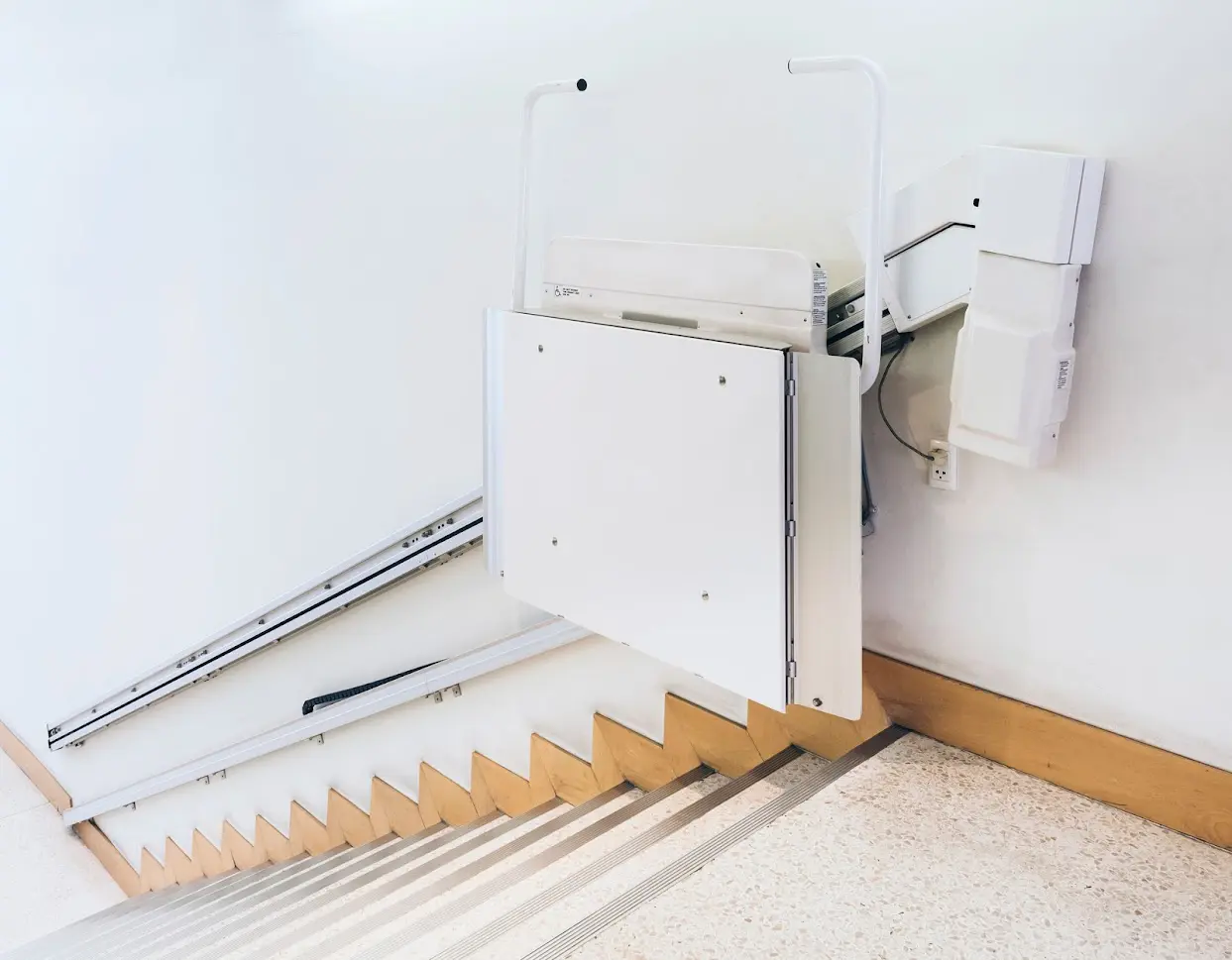 A sliding disability stairs lift facility