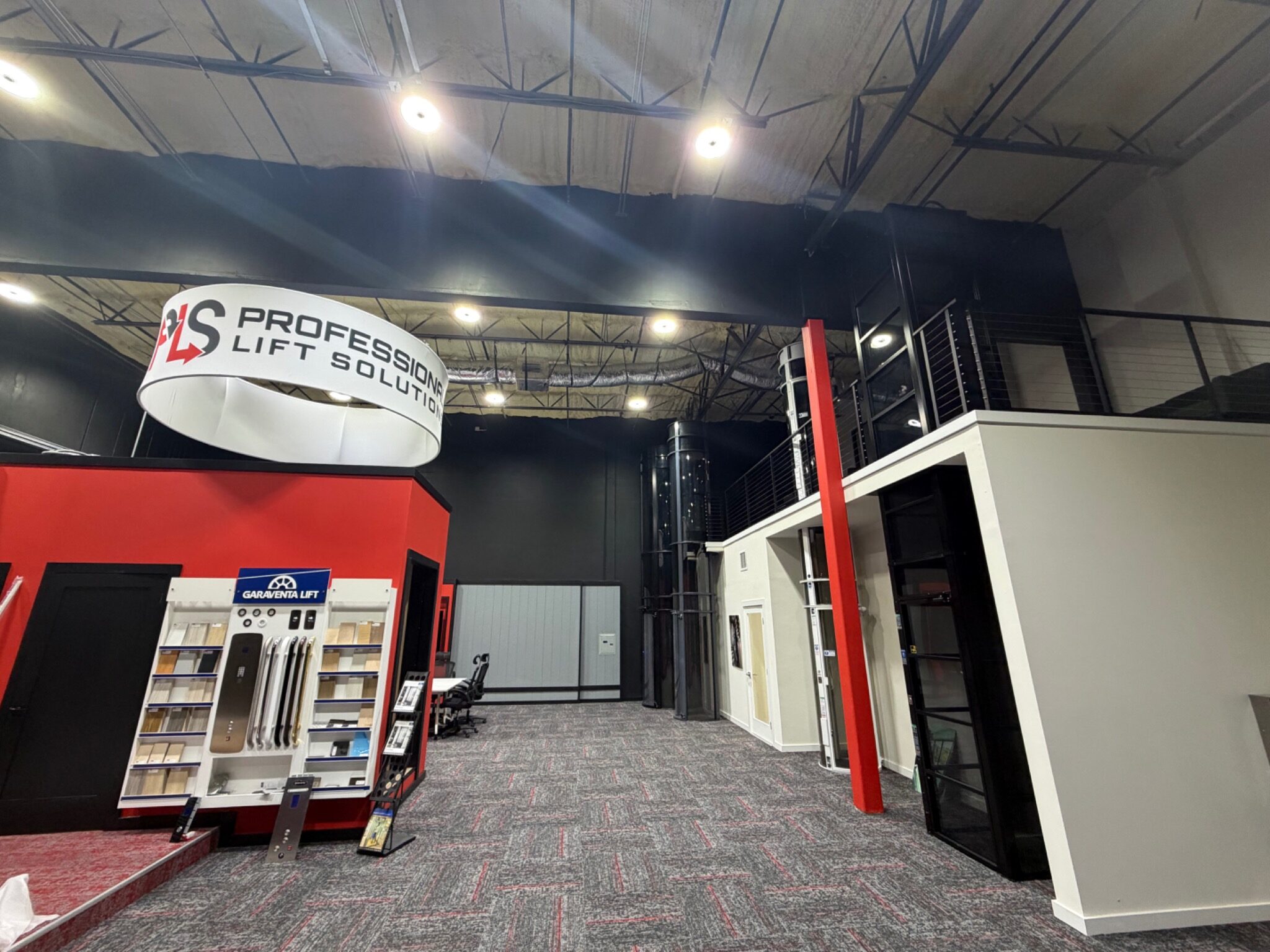 Showroom interior with lift equipment and offices